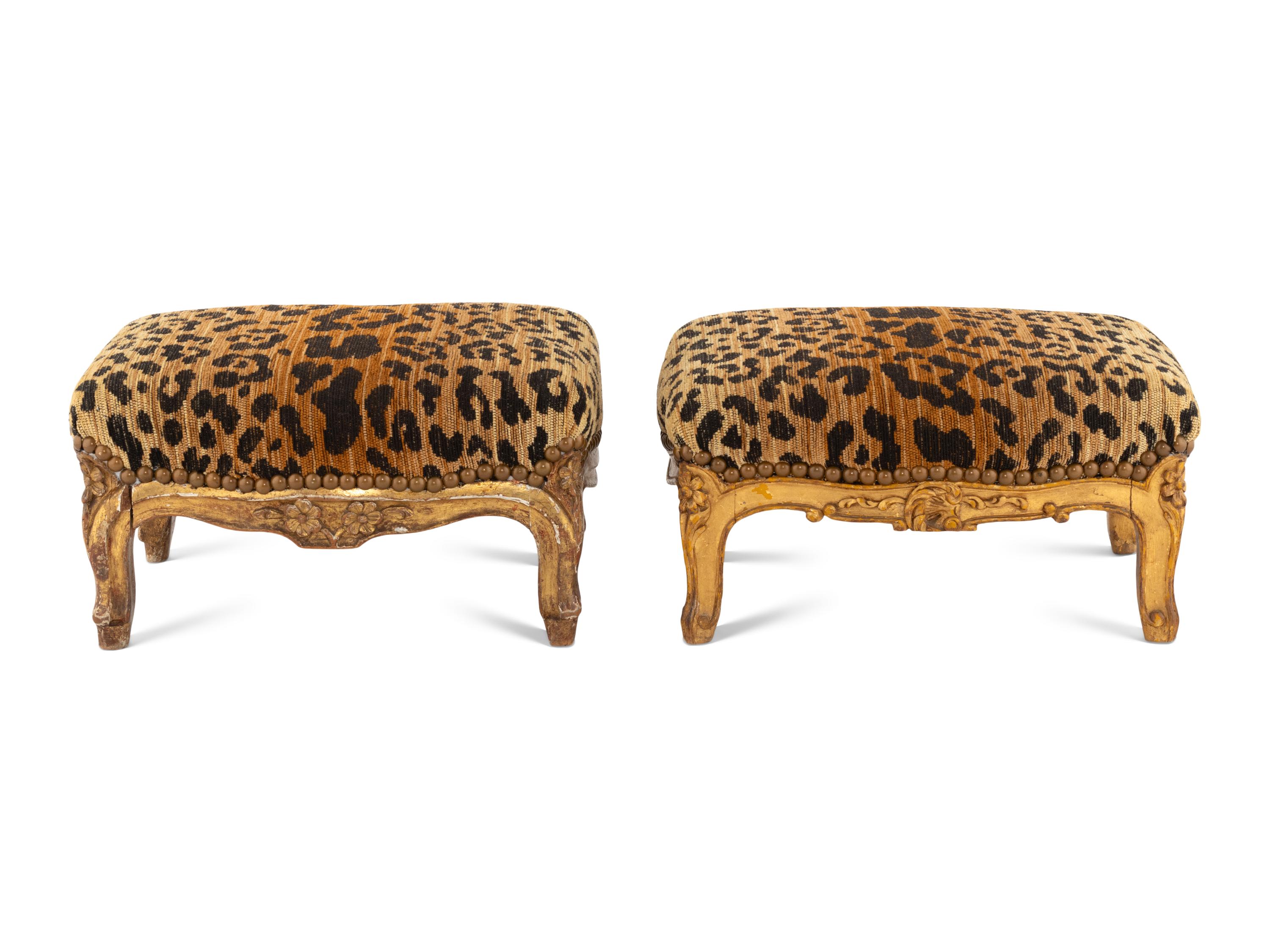 A Near Pair of Louis XV Giltwood Tabourets