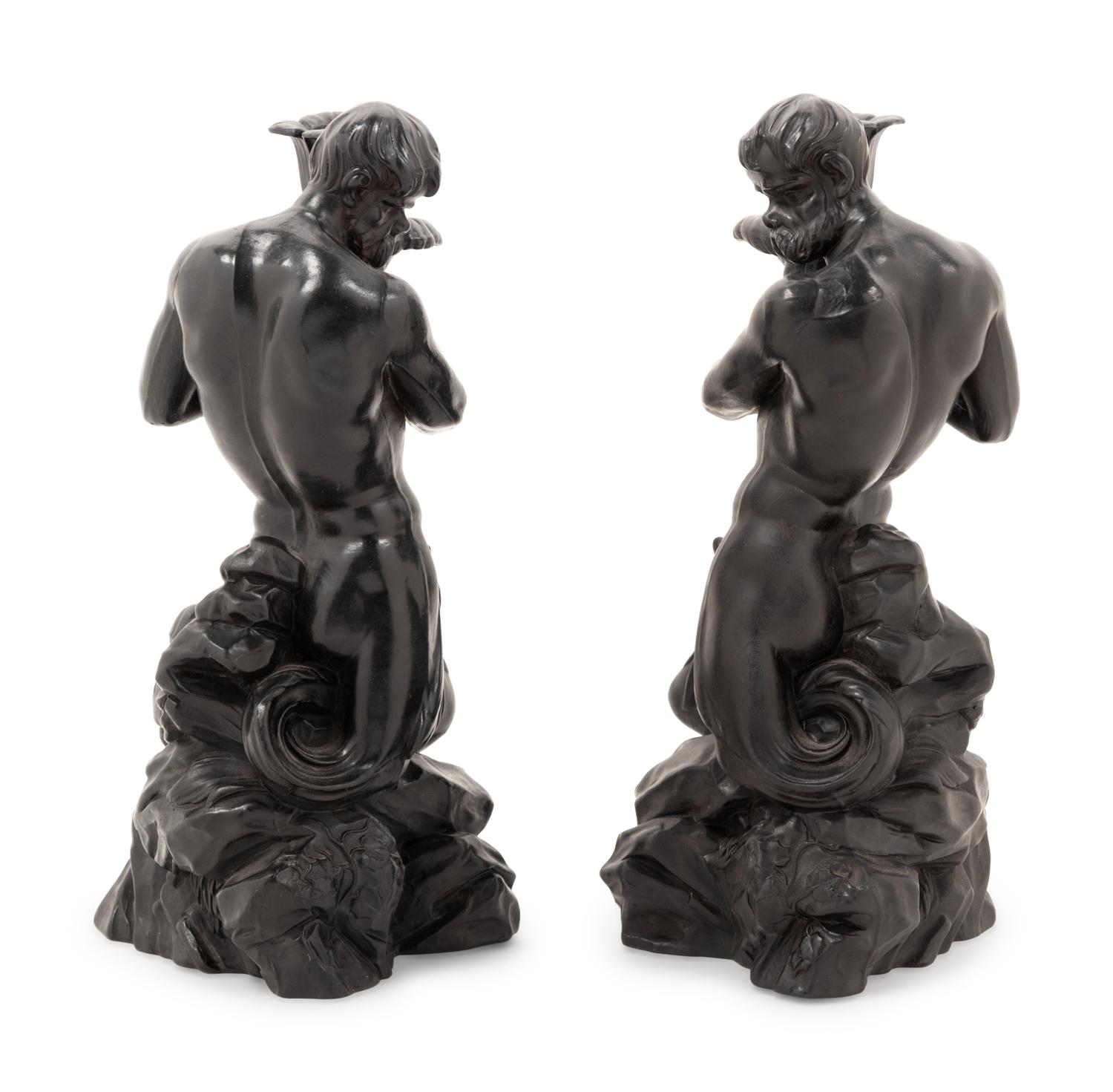 A Pair of Wedgwood Black Basalt Triton Candlesticks