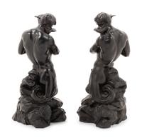 A Pair of Wedgwood Black Basalt Triton Candlesticks