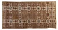 An Oushak Wool Rug, 10 feet 5 inches x 5 feet 6 inches.