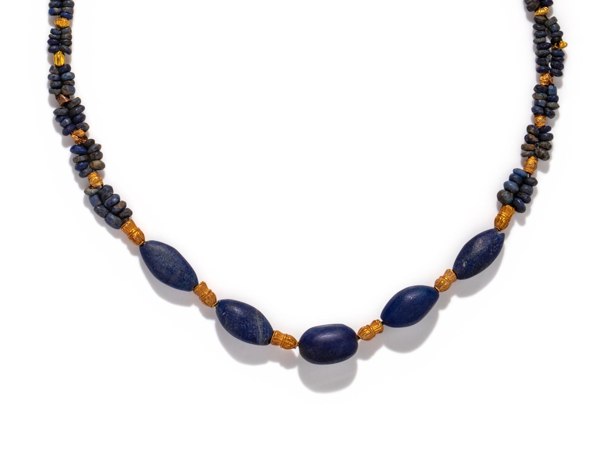 A Western Asiatic Lapis Lazuli and Gold Bead Necklace