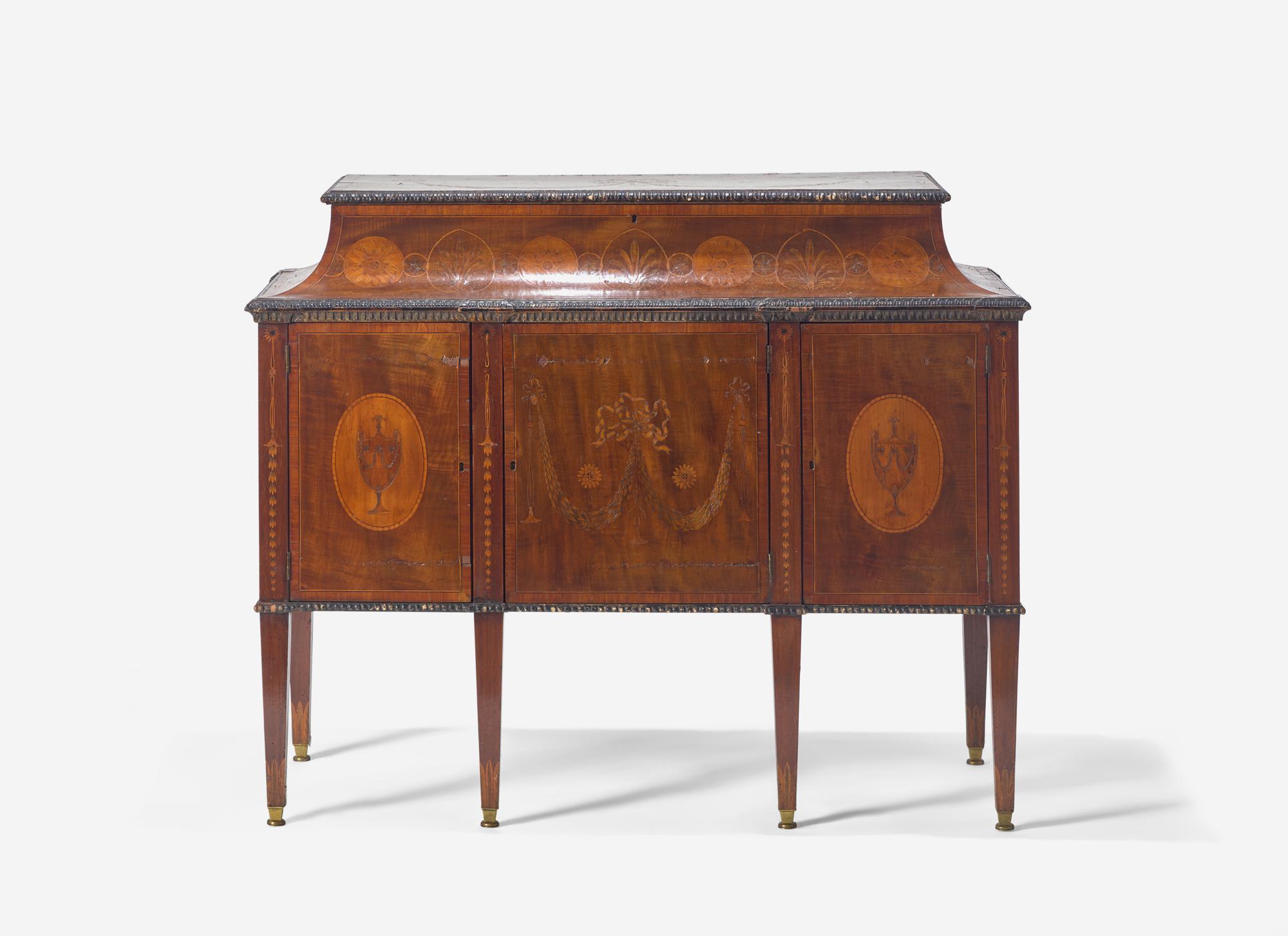 An Important George III Harewood and Marquetry Commode