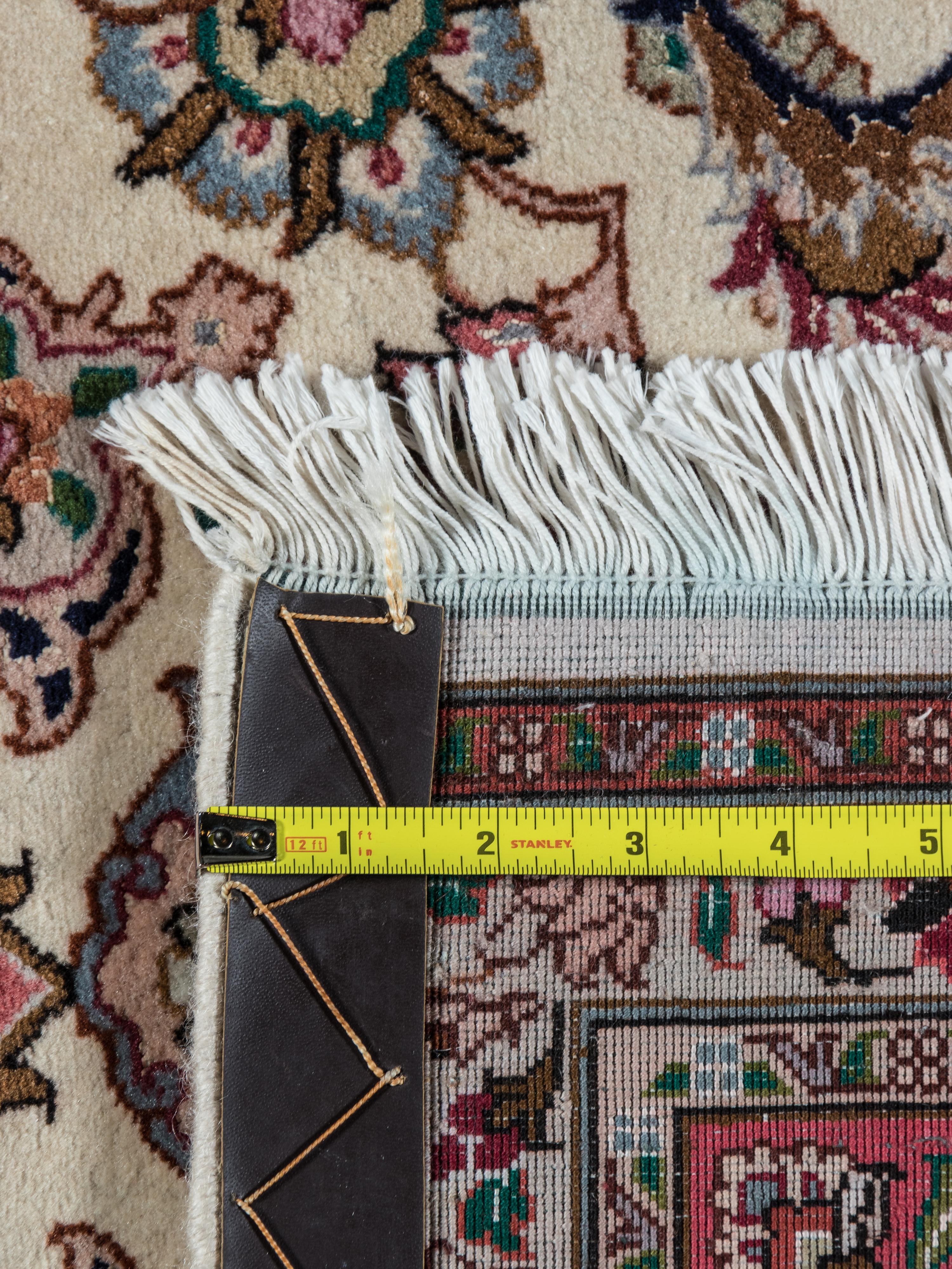 A Tabriz Wool Rug