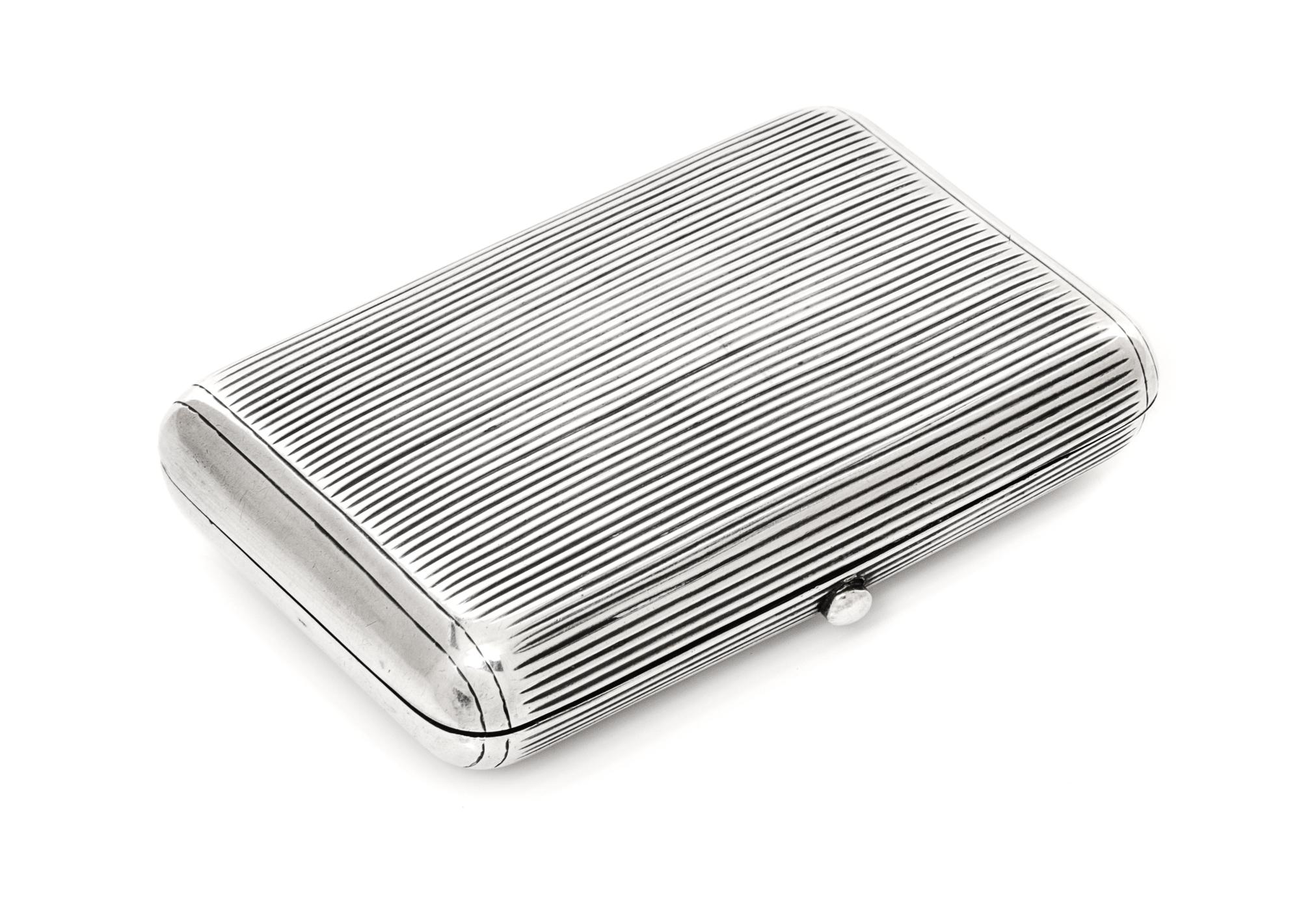 A Russian Silver Cigarette Case, Maker's mark AE, assay mark of Lev Oleks, Moscow, 1896, the lid and underside with reeded decoration.
