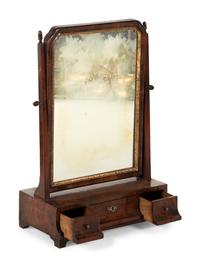 A George II Parcel Gilt Walnut Dressing Mirror