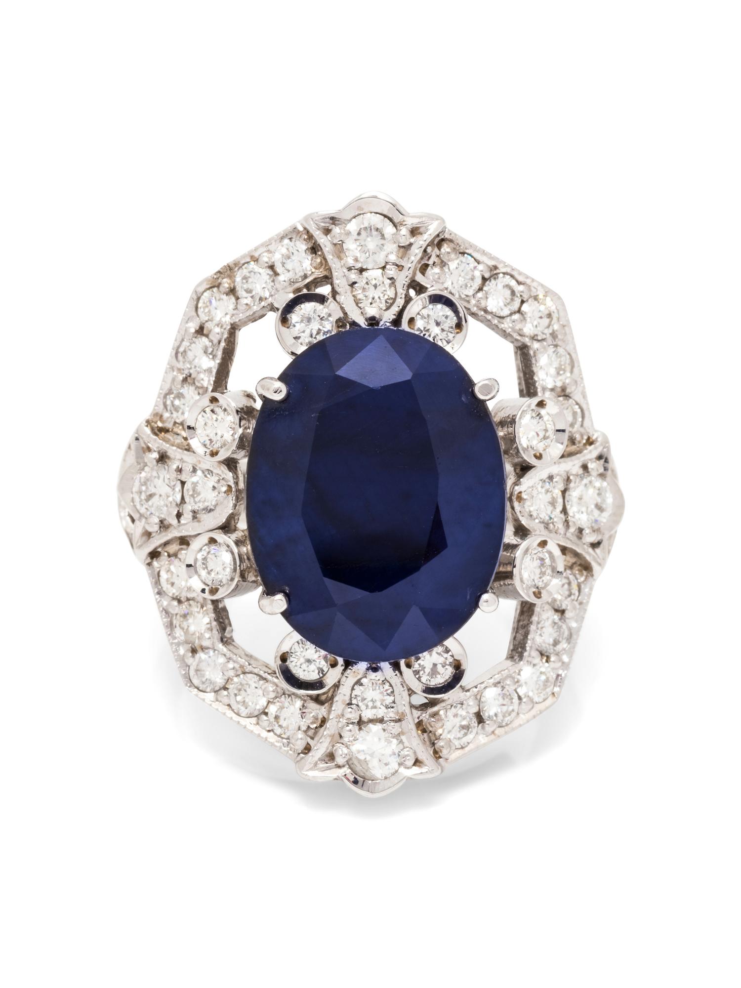 A 14 Karat White Gold, Sapphire and Diamond Ring,