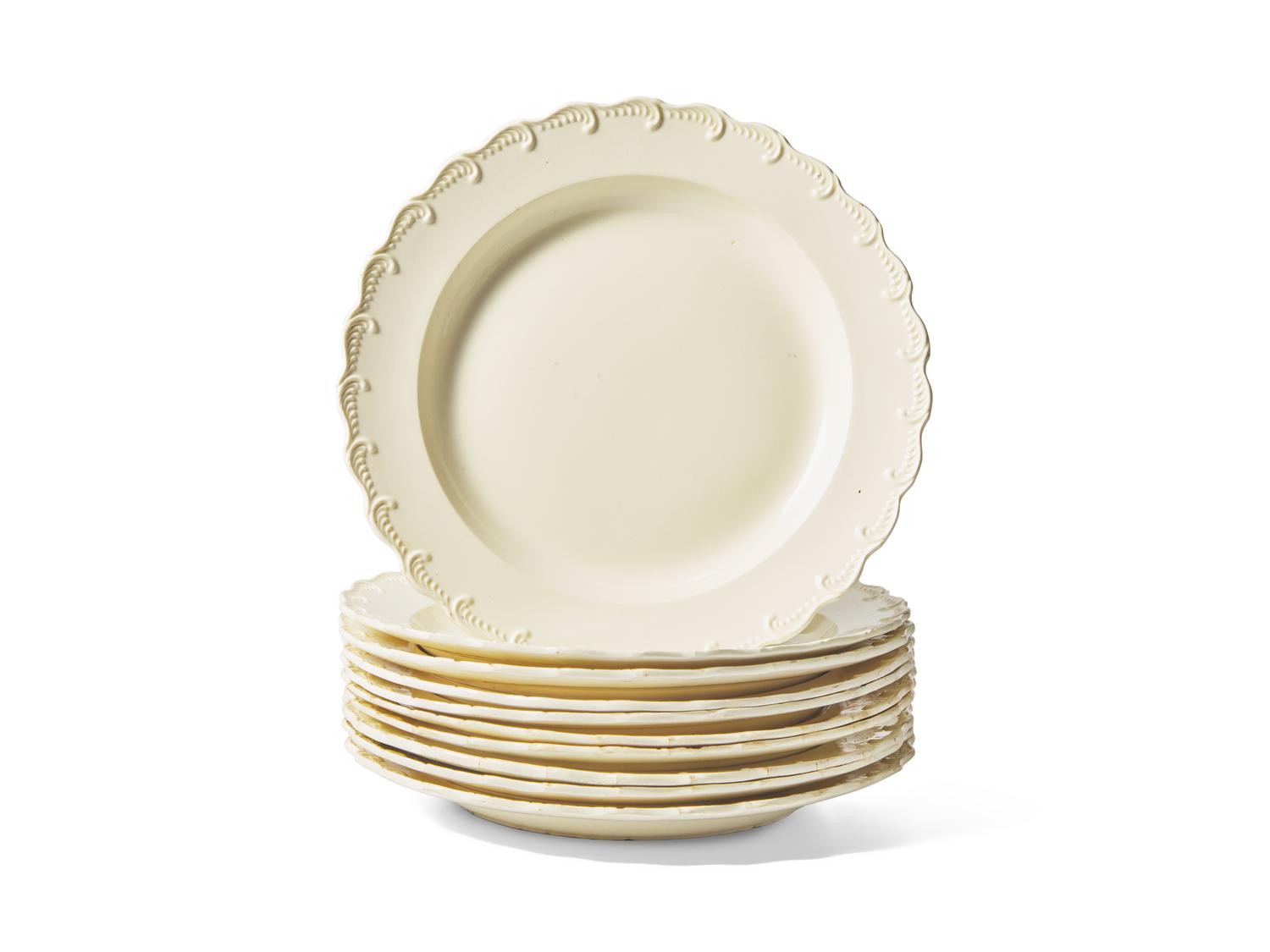 A Set of Ten Scalloped Creamware Dinner Plates