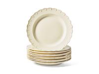 A Set of Ten Scalloped Creamware Dinner Plates