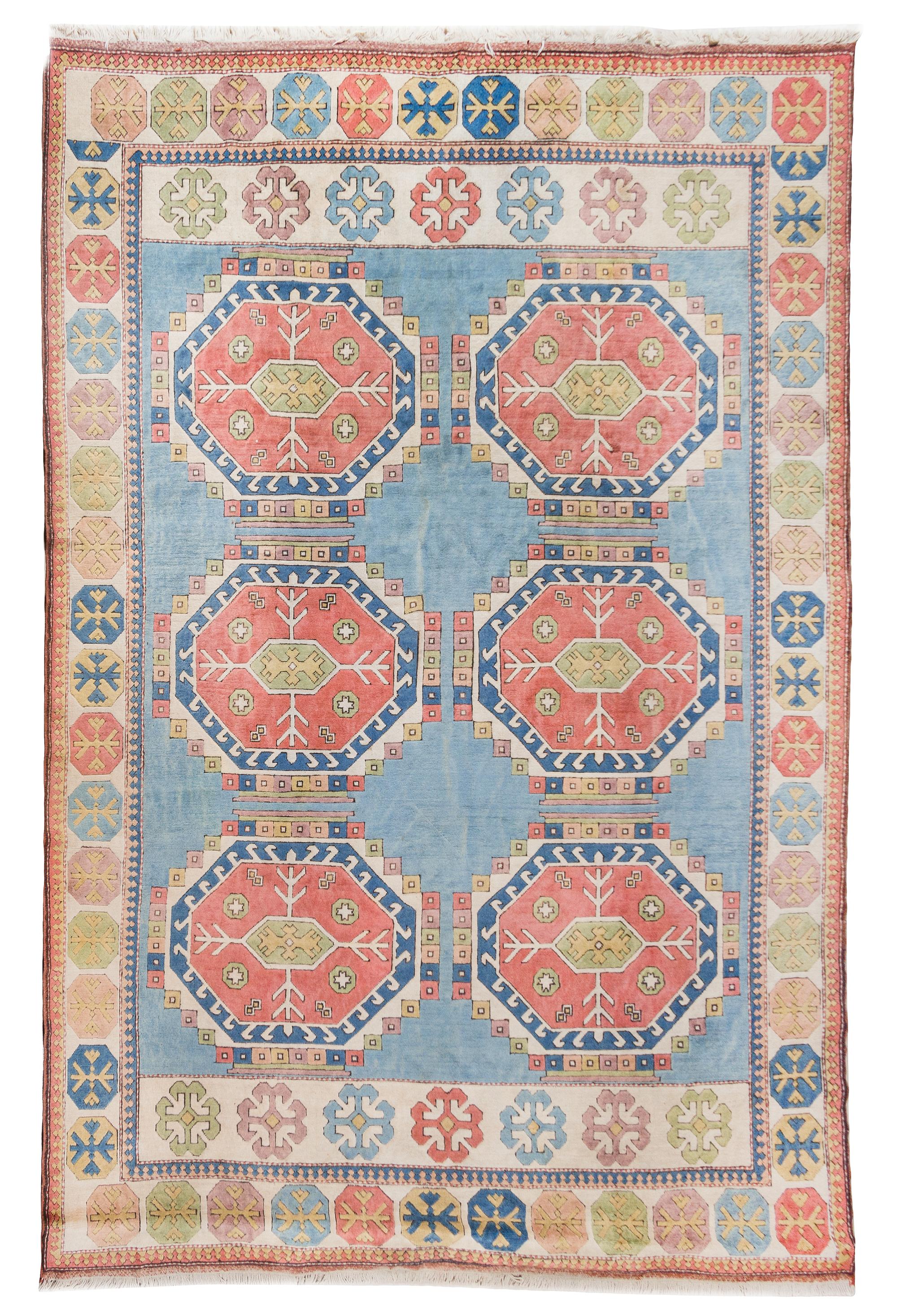 A Caucasian Wool Rug 12 feet 4 inches x 9 feet 8 inches. — LATE 19TH CENTURY