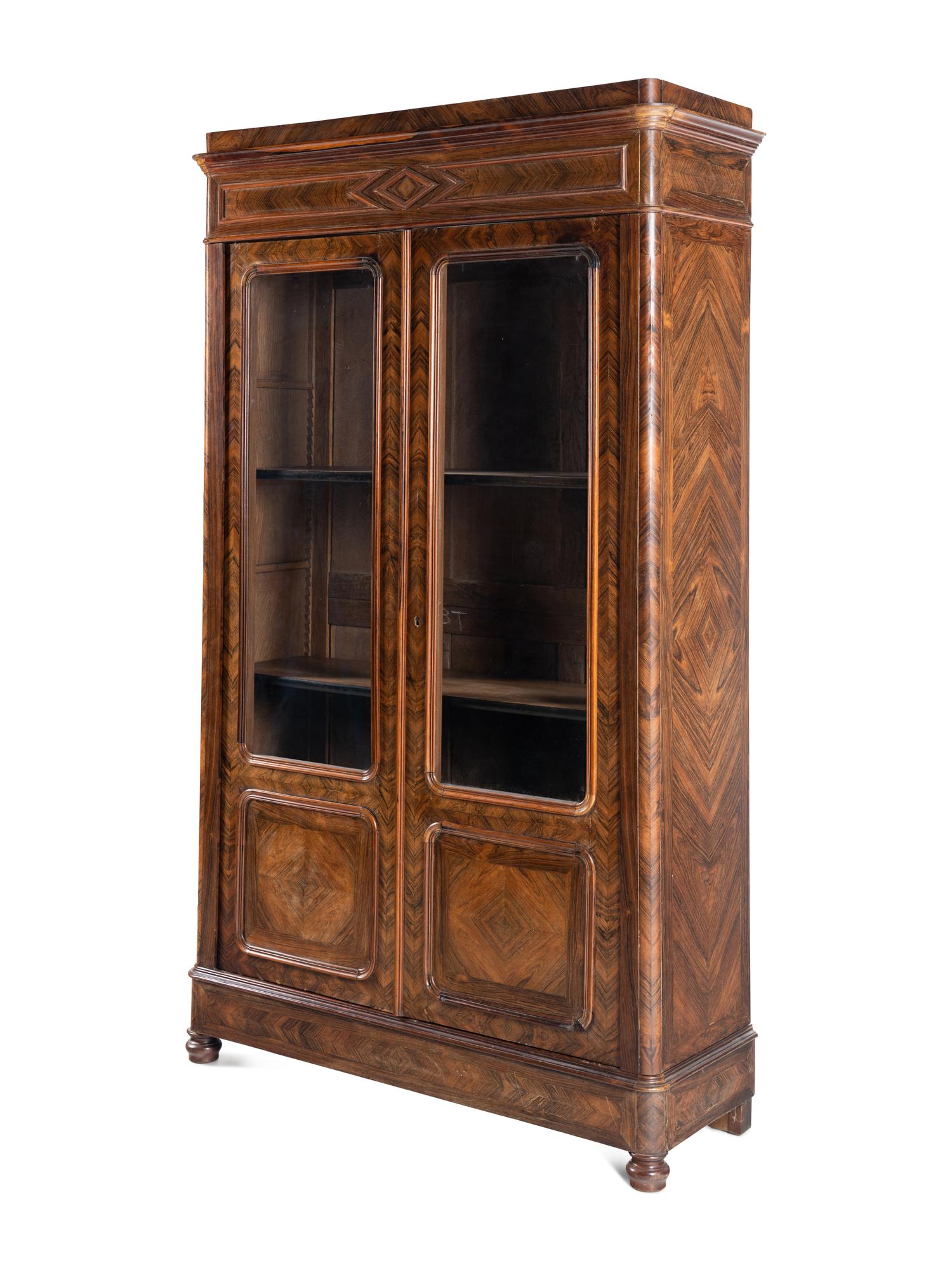 A Continental Walnut Bookcase