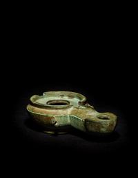 A Roman Bronze Oil Lamp
