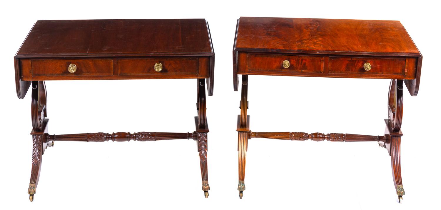 A Near Pair of American Classical Style Mahogany Drop-Leaf Tables Height of larger 28 x width 52 x depth 24 inches. — LATE 19TH/EARLY 20TH CENTURY