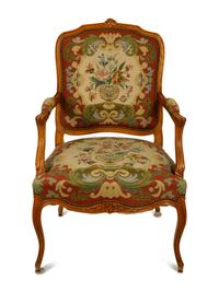 A Louis XV Style Carved Mahogany Fauteuil — 19TH CENTURY