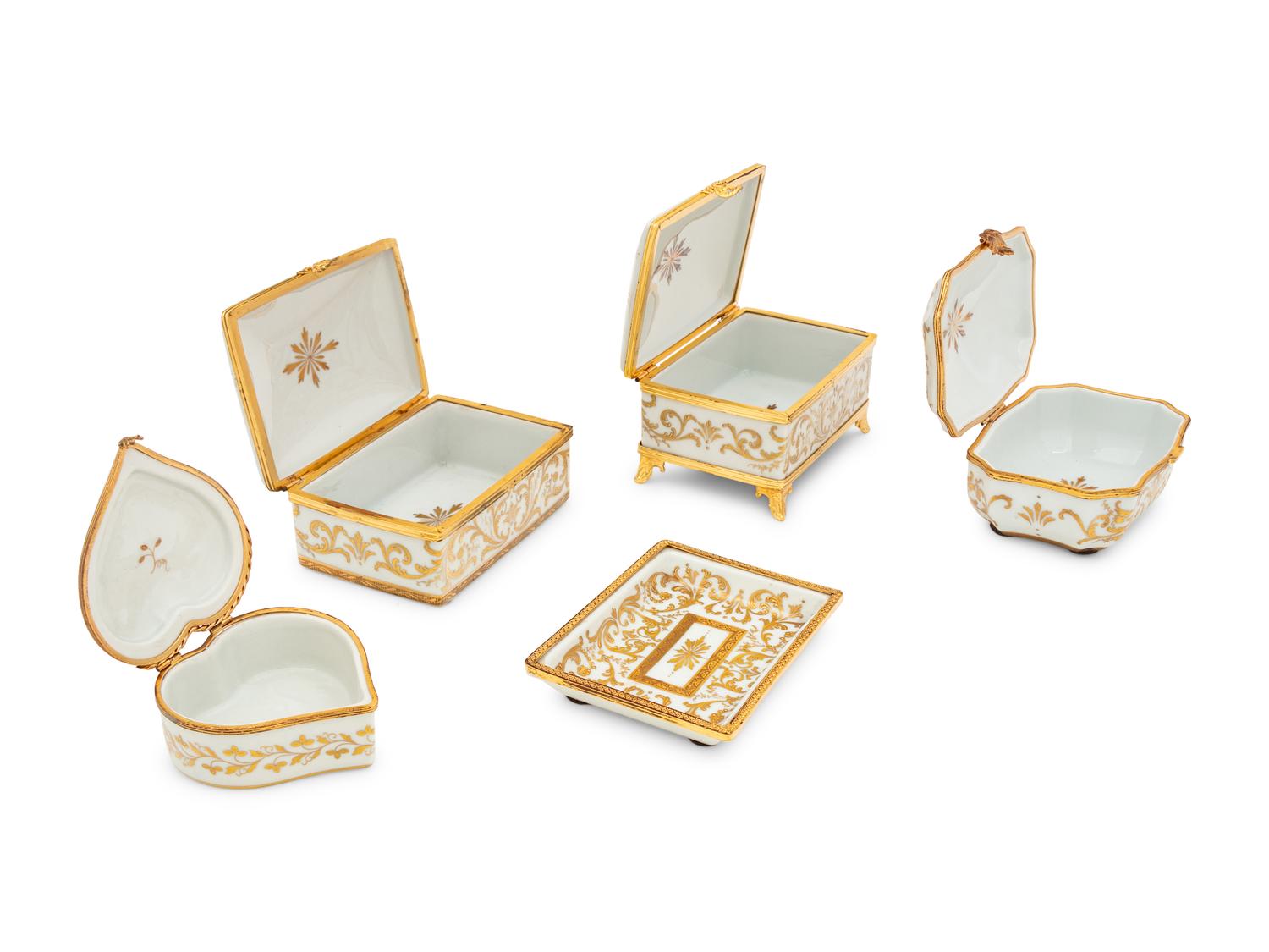 A Collection of French Painted Porcelain Table Articles