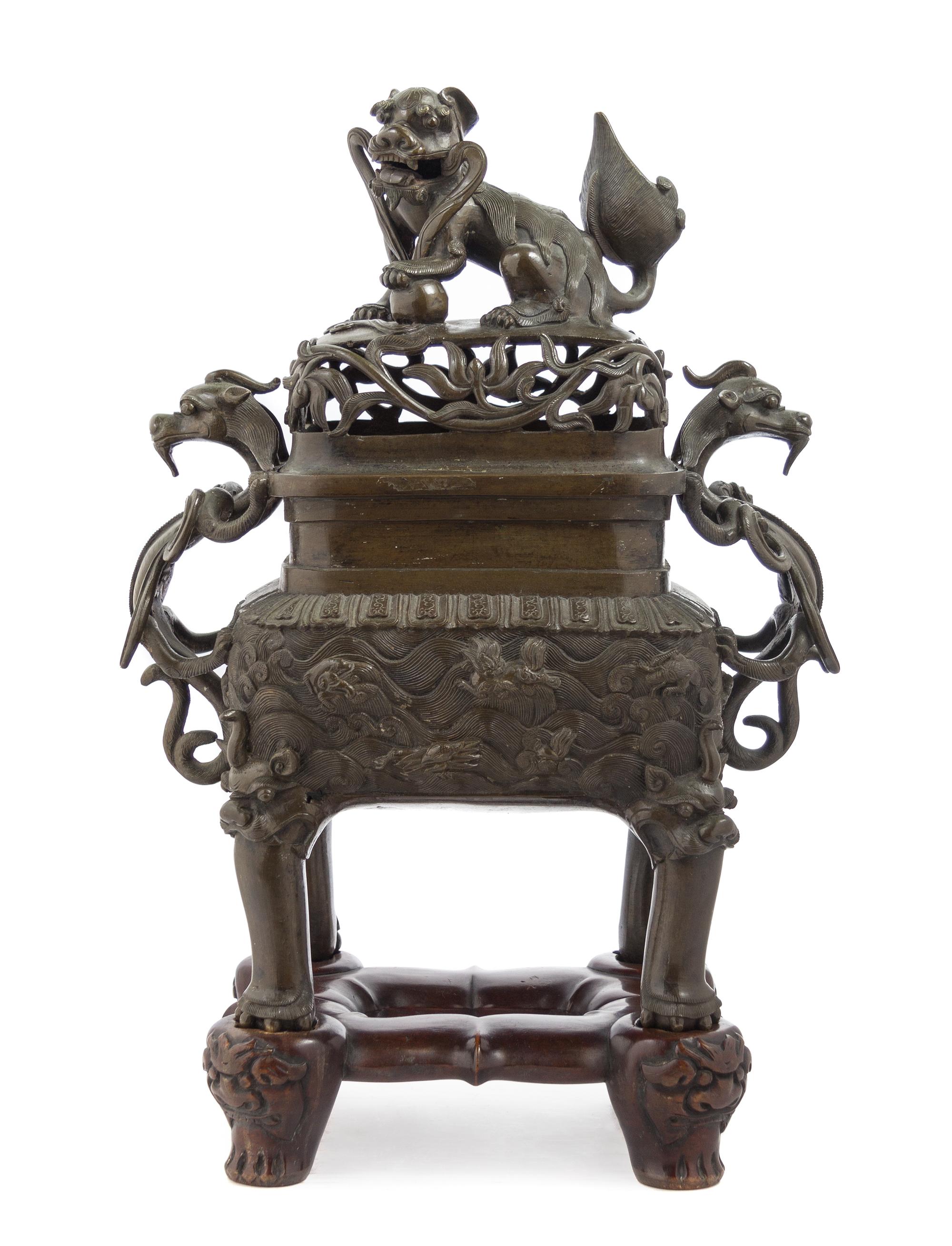 A Chinese Bronze Covered Censer 17TH/18TH CENTURY Height 17 inches. — 17TH/18TH CENTURY
