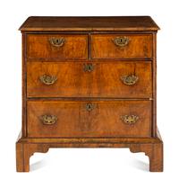 A George II Walnut Chest of Drawers
