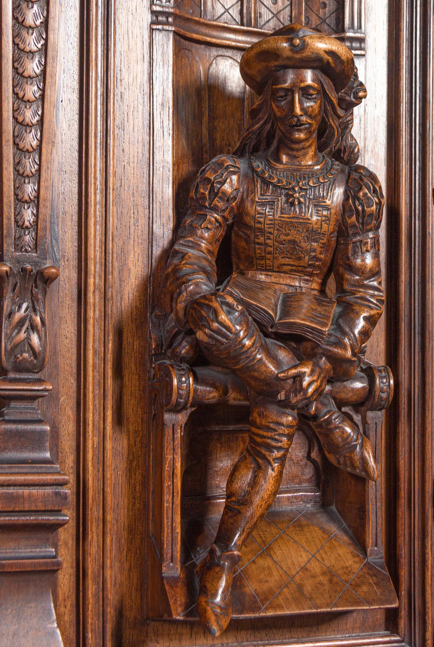 A French Renaissance Revival Carved Walnut Cabinet