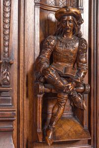 A French Renaissance Revival Carved Walnut Cabinet