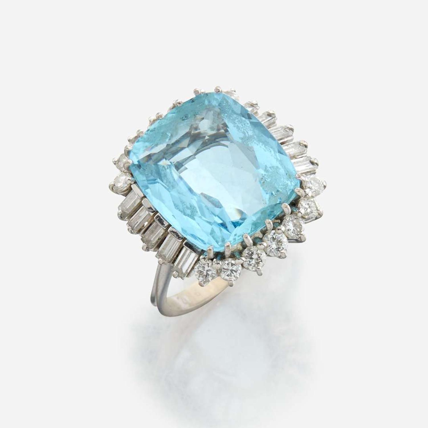 An aquamarine, diamond, and white gold ring