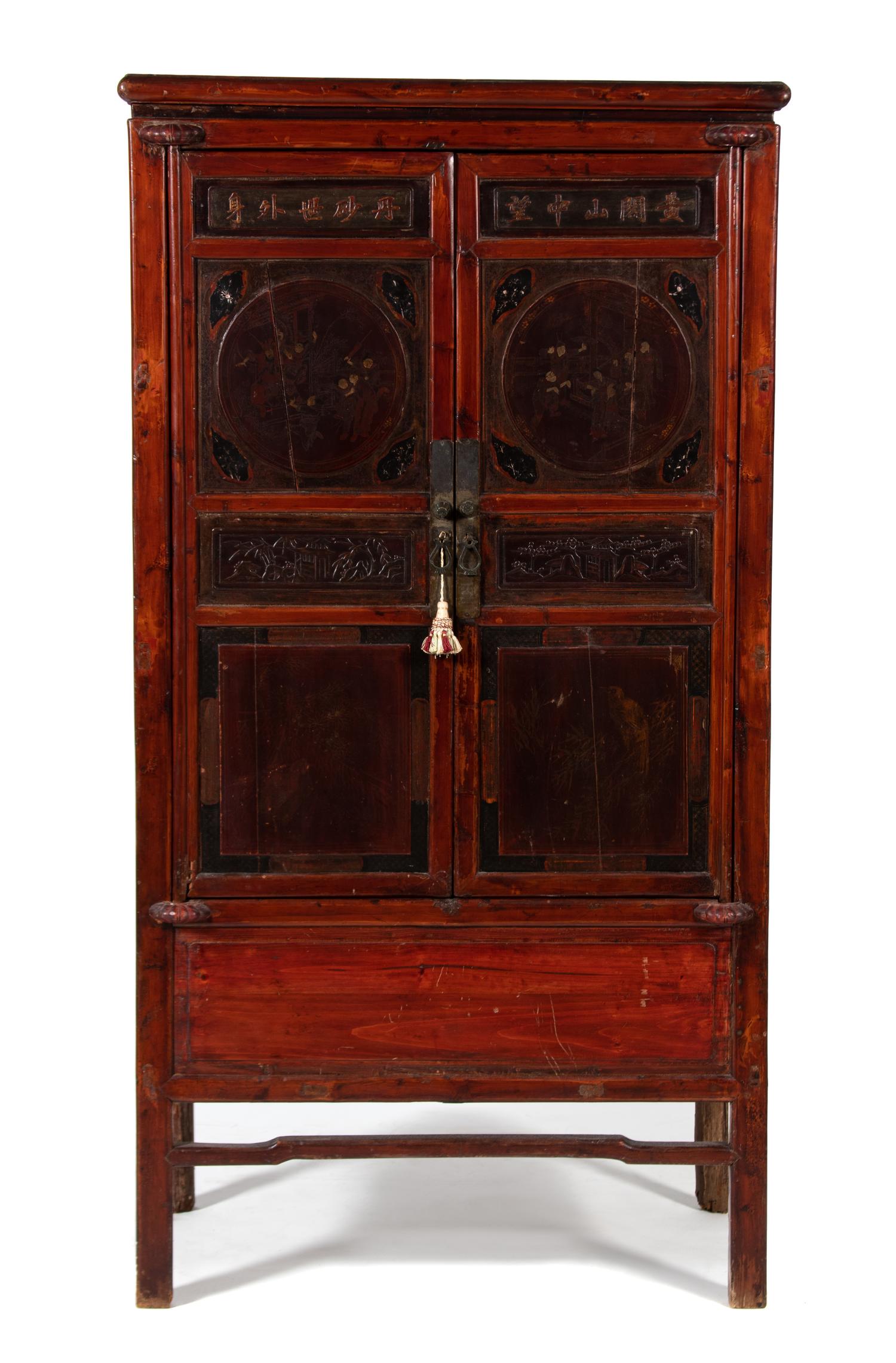 An Asian Hardwood Two-Door Cabinet — 19TH CENTURY