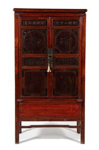 An Asian Hardwood Two-Door Cabinet — 19TH CENTURY