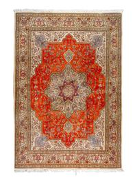 A Tabriz Wool Rug