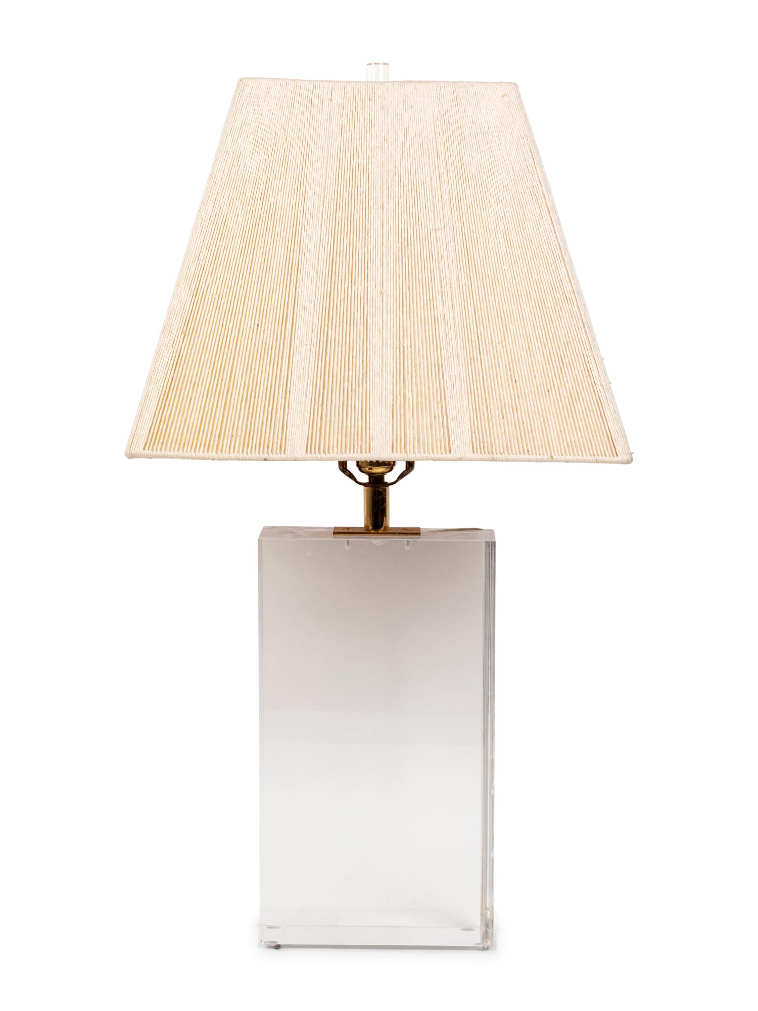 A Lucite Table Lamp with a Pleated Shade