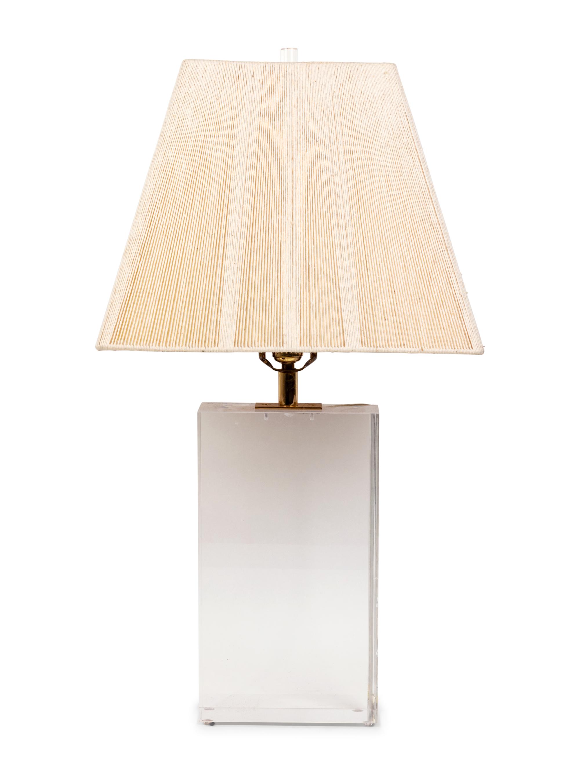 A Lucite Table Lamp with a Pleated Shade