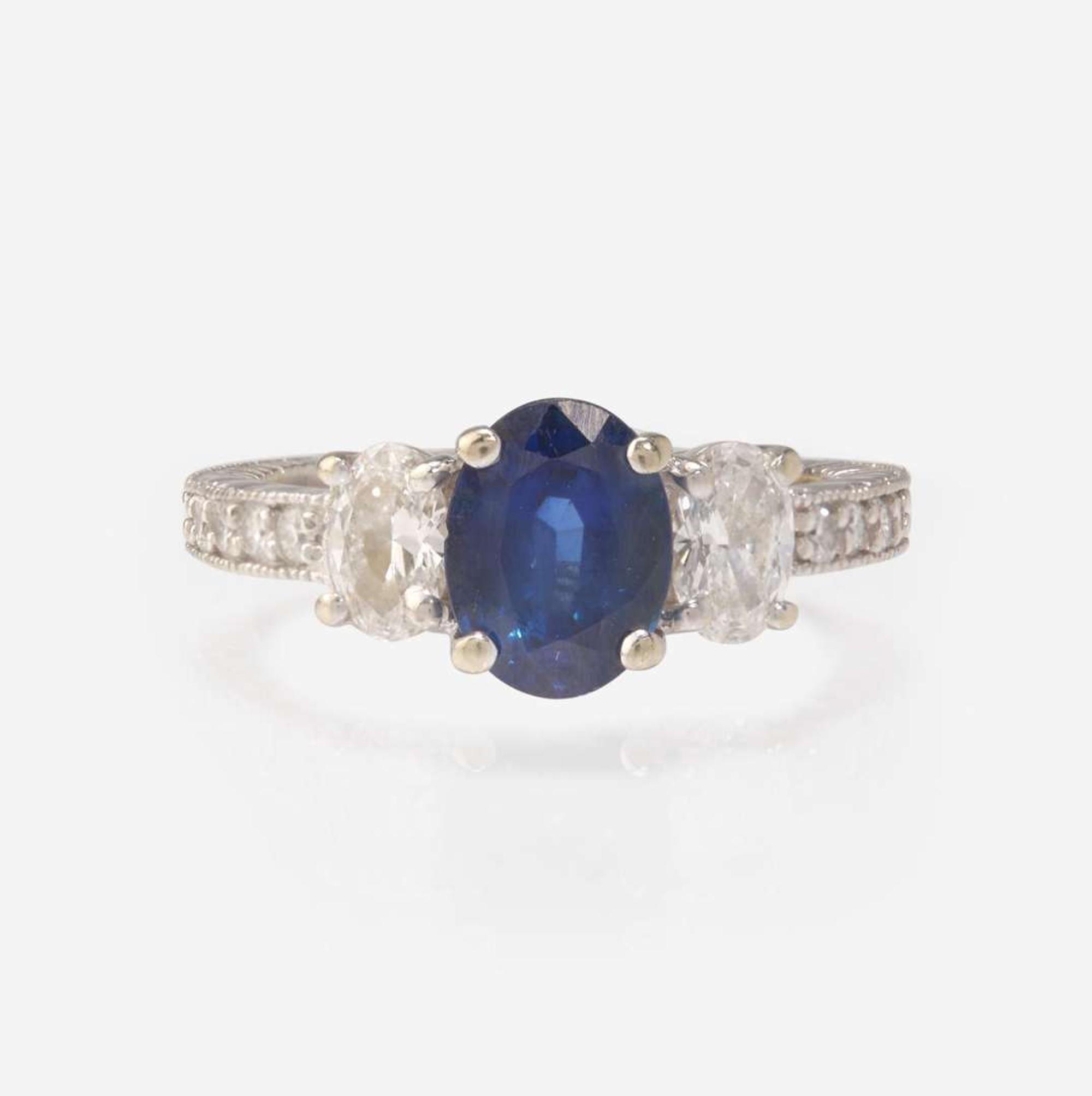 A Sapphire and Diamond White Gold Ring