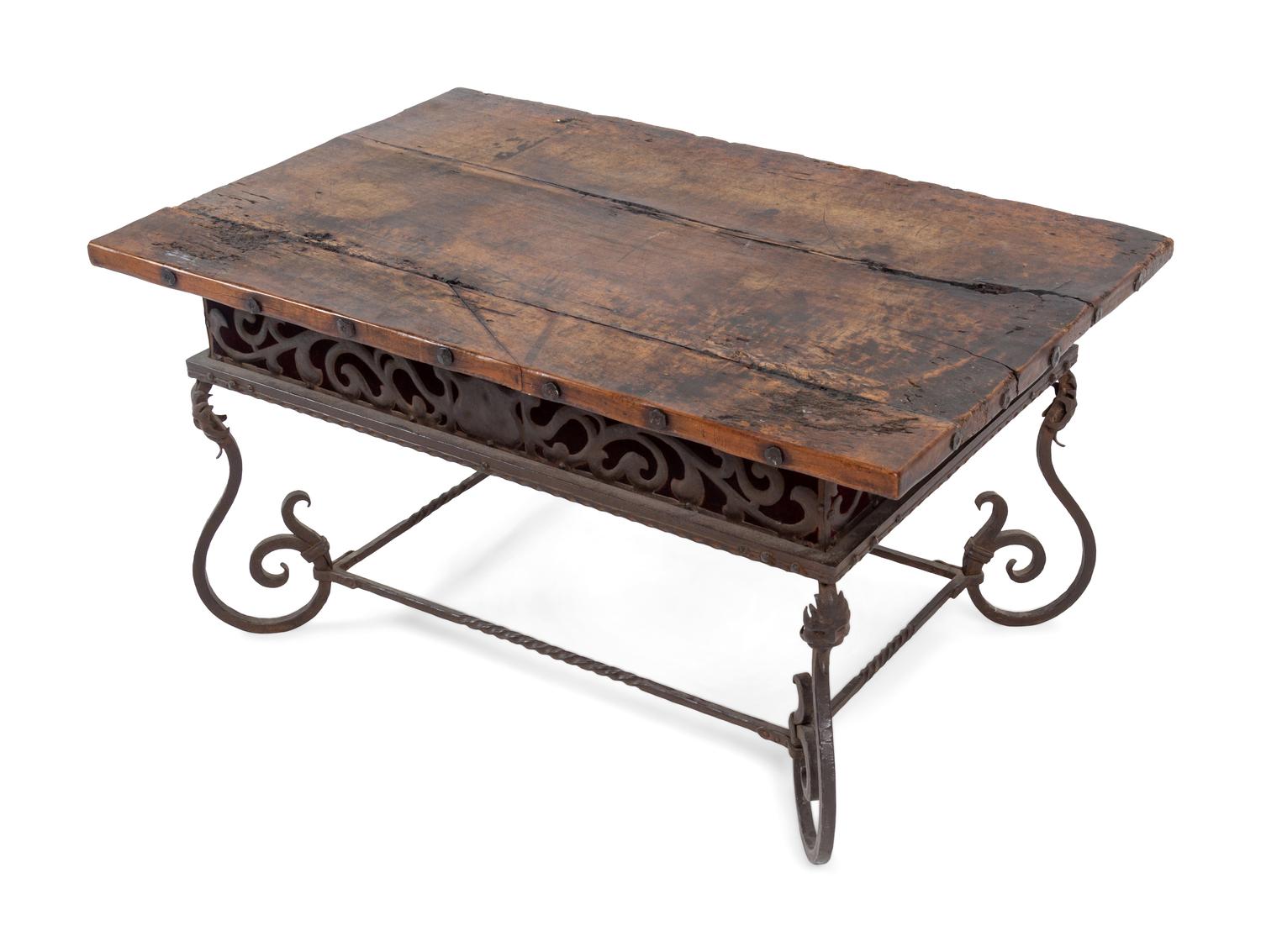 A Spanish Baroque Style Iron and Walnut Low Table