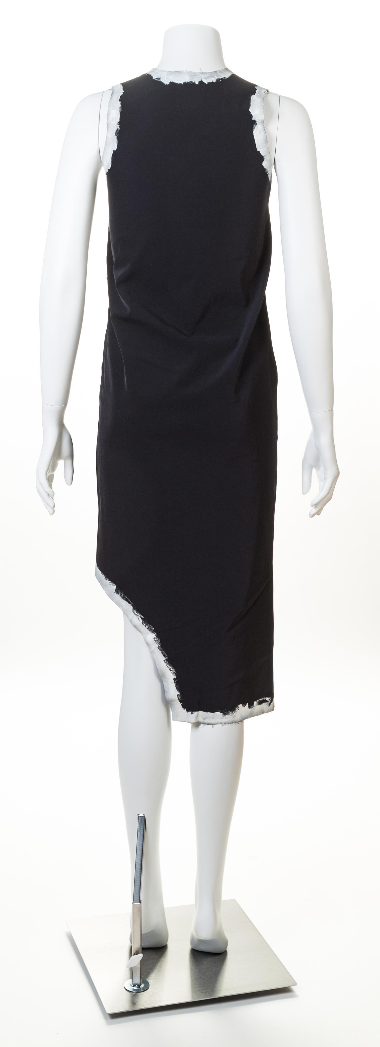 A Comme des Garcons Painted Edge Cutaway Black Dress, Size small.