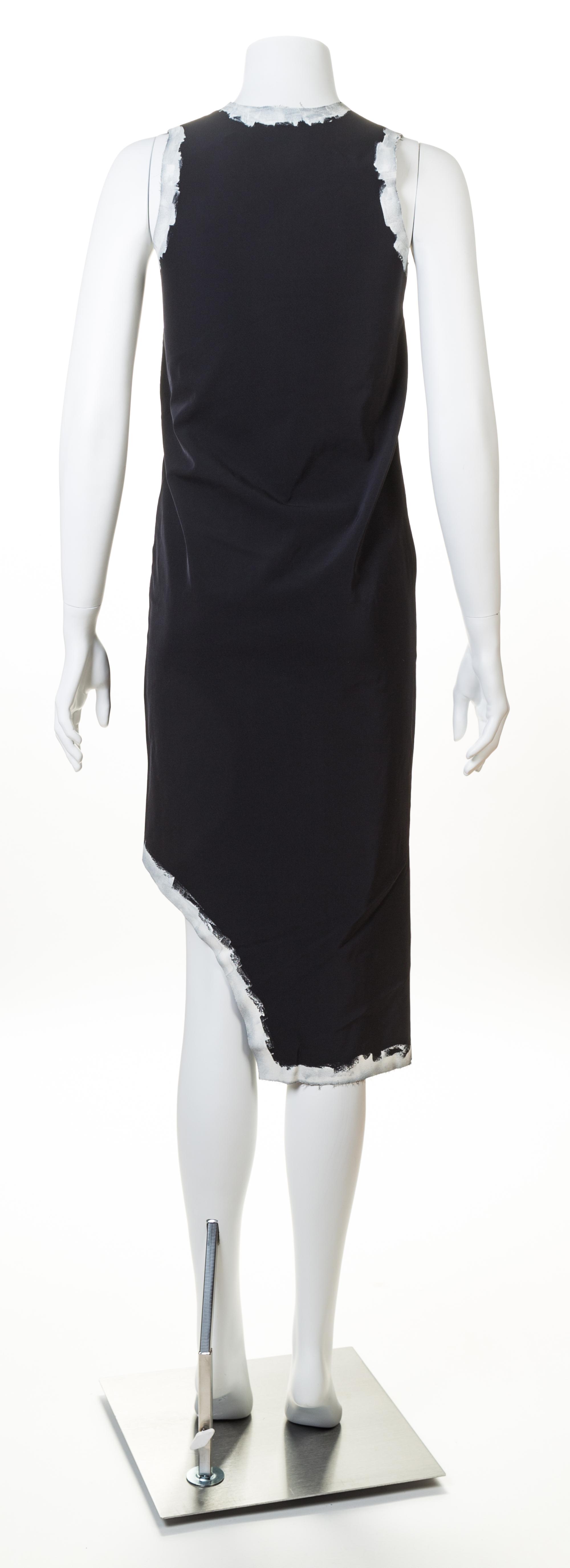 A Comme des Garcons Painted Edge Cutaway Black Dress, Size small.