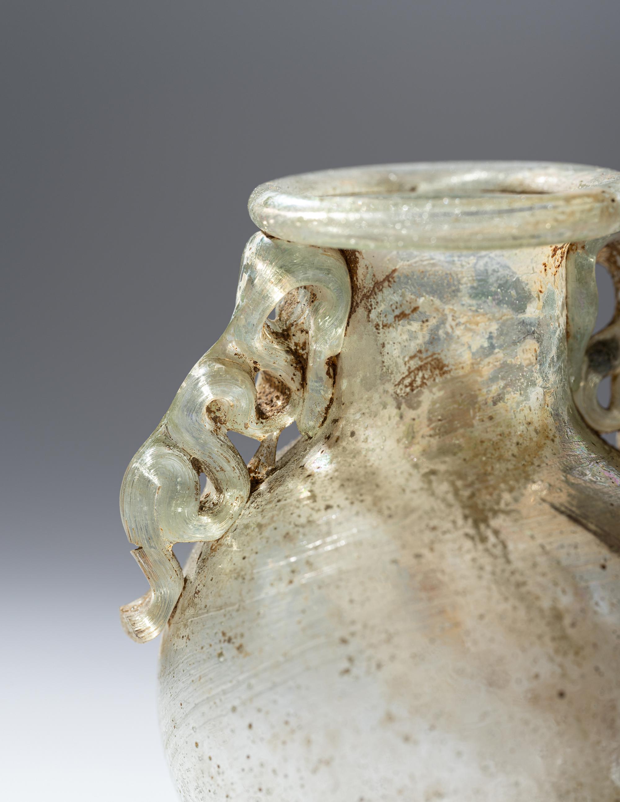 A Roman Green Glass Araballos