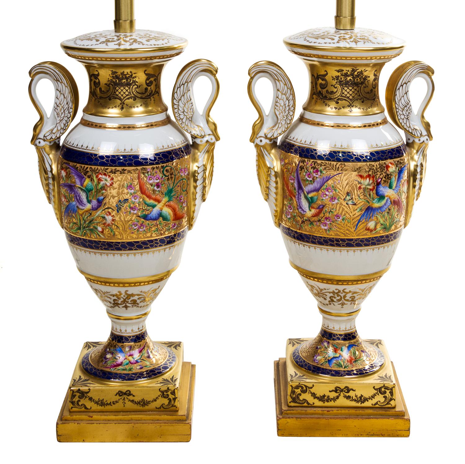 A Pair of French Porcelain Urns Height 38 inches overall. — LATE 19TH CENTURY