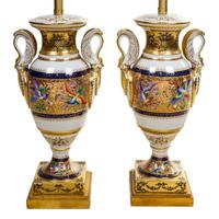 A Pair of French Porcelain Urns Height 38 inches overall. — LATE 19TH CENTURY