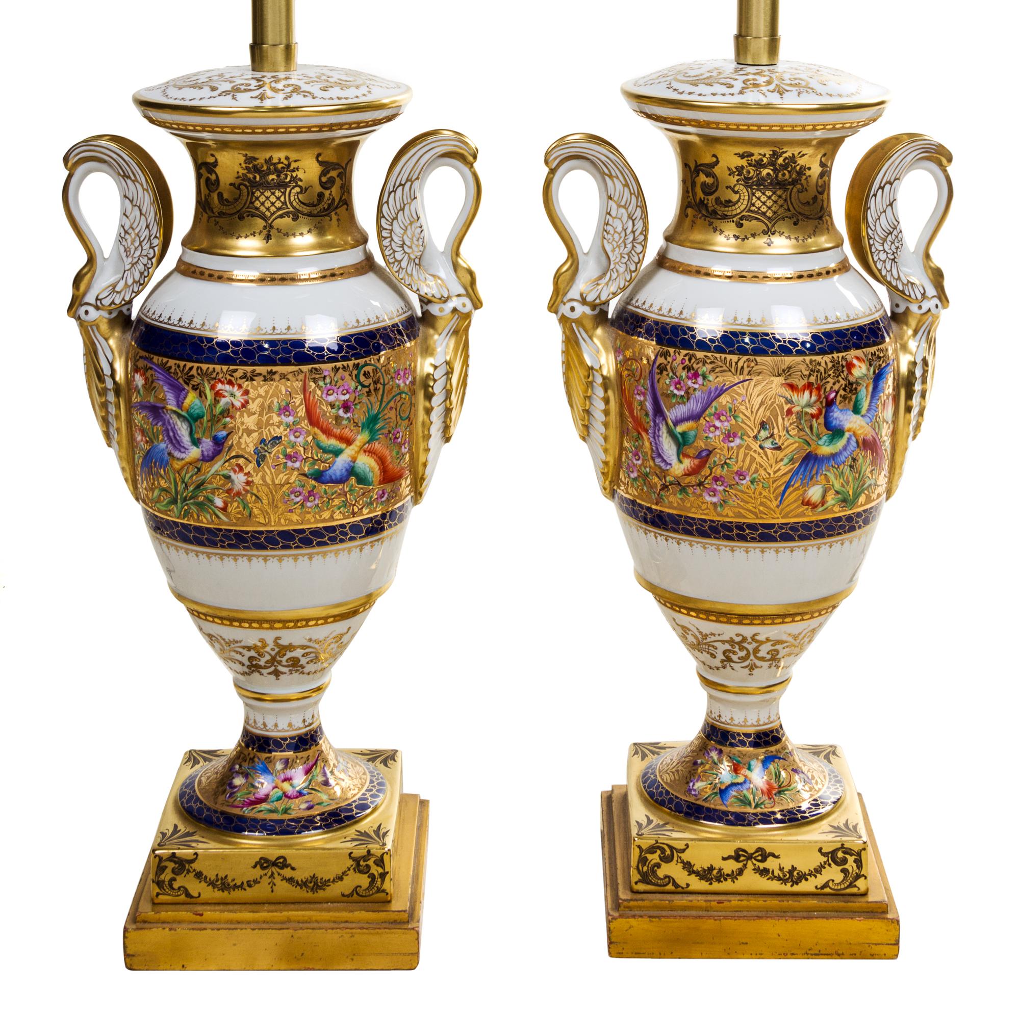 A Pair of French Porcelain Urns Height 38 inches overall. — LATE 19TH CENTURY