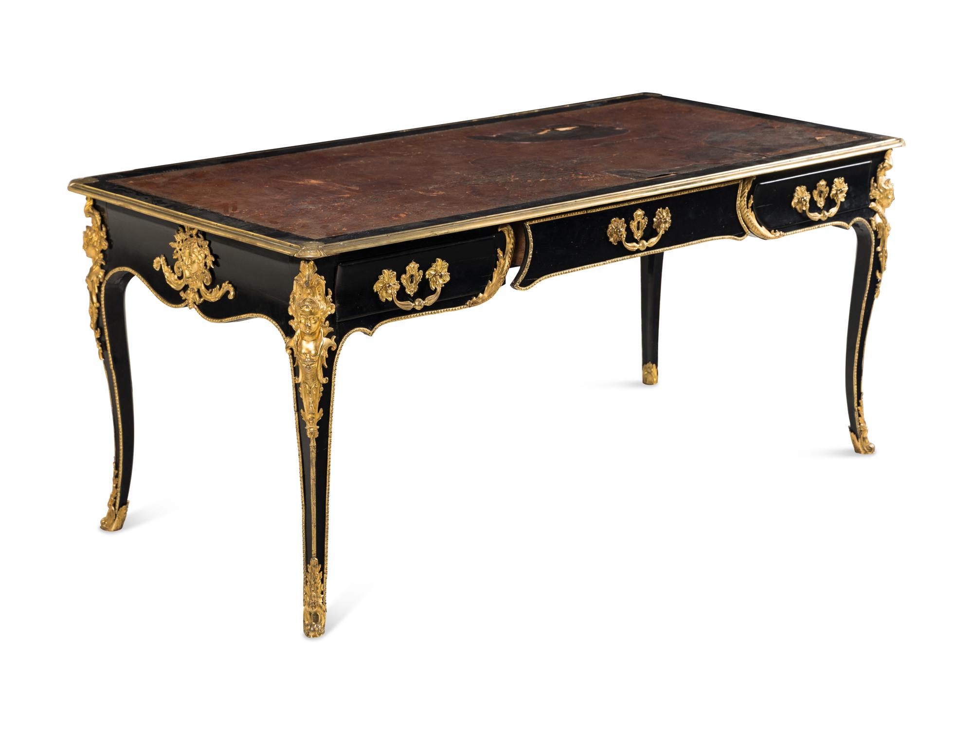 A Louis XV Style Gilt Bronze Mounted Ebonized Bureau Plat