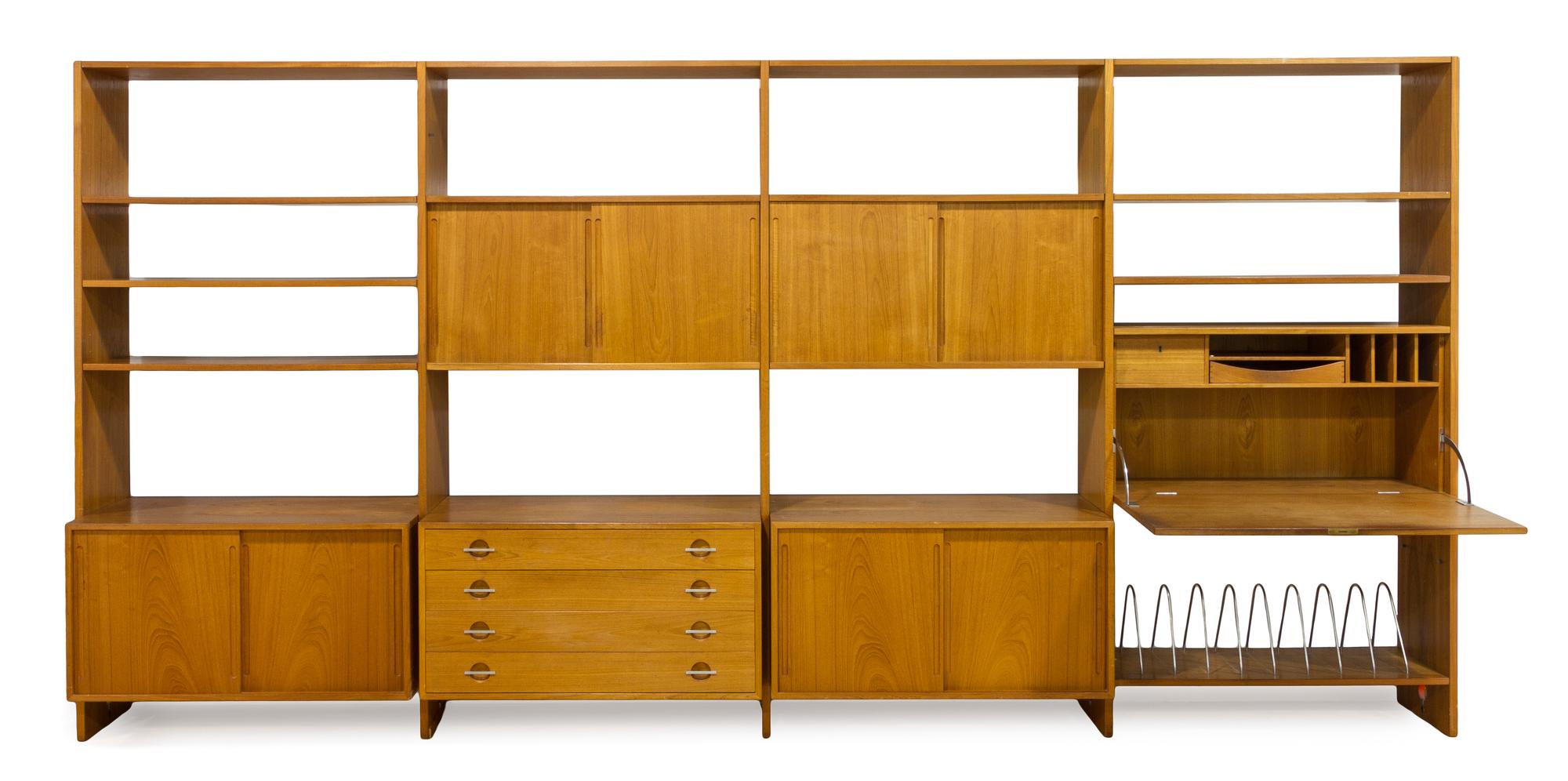 A Four-Part Teak Wall Unit, Hans Wegner for Ry Mobler Height of each part 81 1/4 x width 40 1/2 x depth 19 1/4 inches.