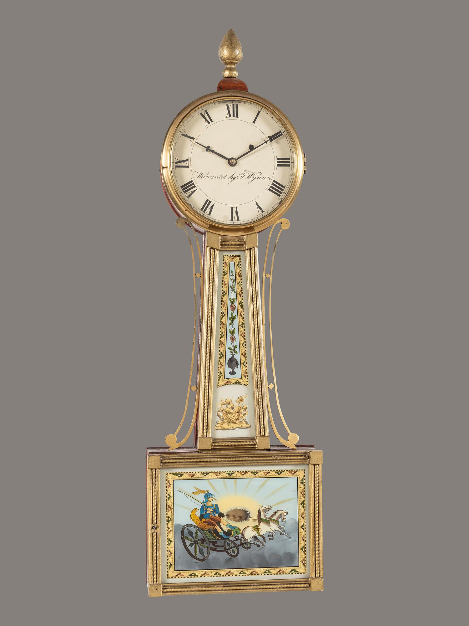 A Federal Mahogany and Eglomise Apollo Banjo Clock