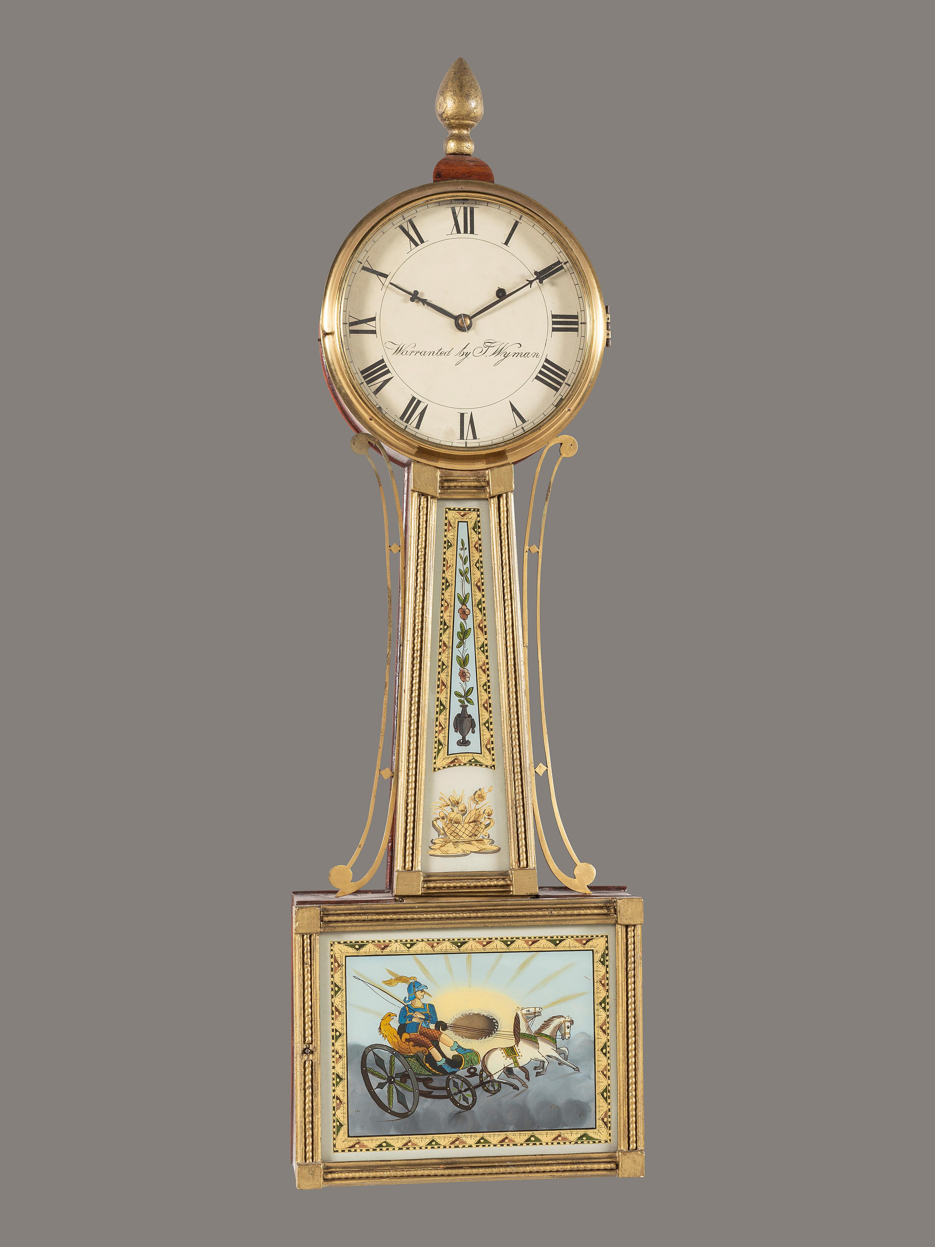 A Federal Mahogany and Eglomise Apollo Banjo Clock