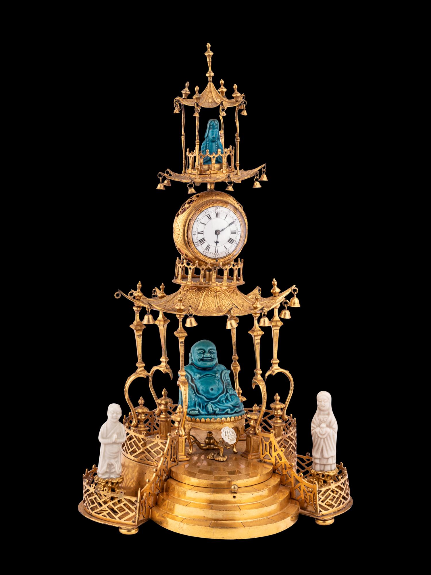 A Louis XV Style Gilt Bronze and Chinese Porcelain Mounted Pagoda-Form Mantel Clock