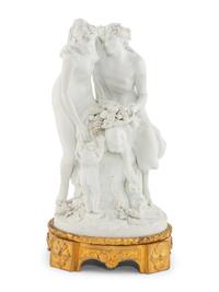 A French Gilt Bronze Mounted Biscuit Porcelain Group
