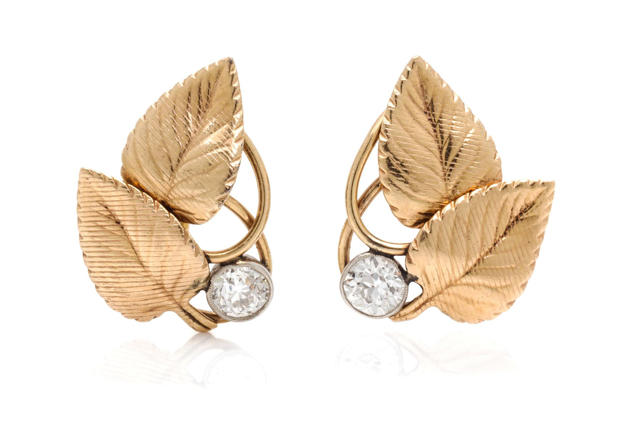 A Pair of Yellow Gold, Platinum and Diamond Leaf Motif Earclips, Harry S. Bick & Sons, 3.80 dwts.