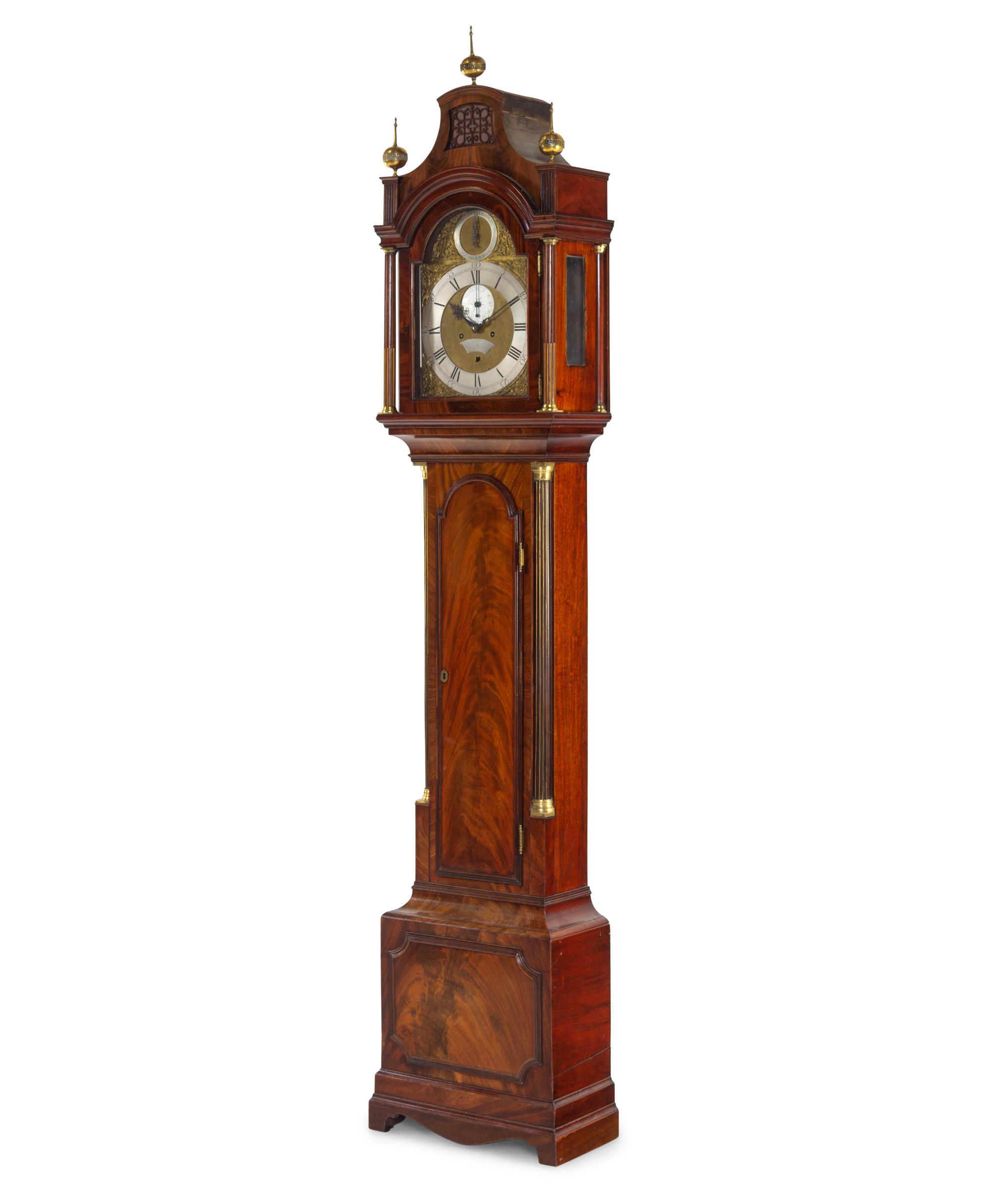 A George III Brass Mounted and Figured Mahogany Tall Case Clock