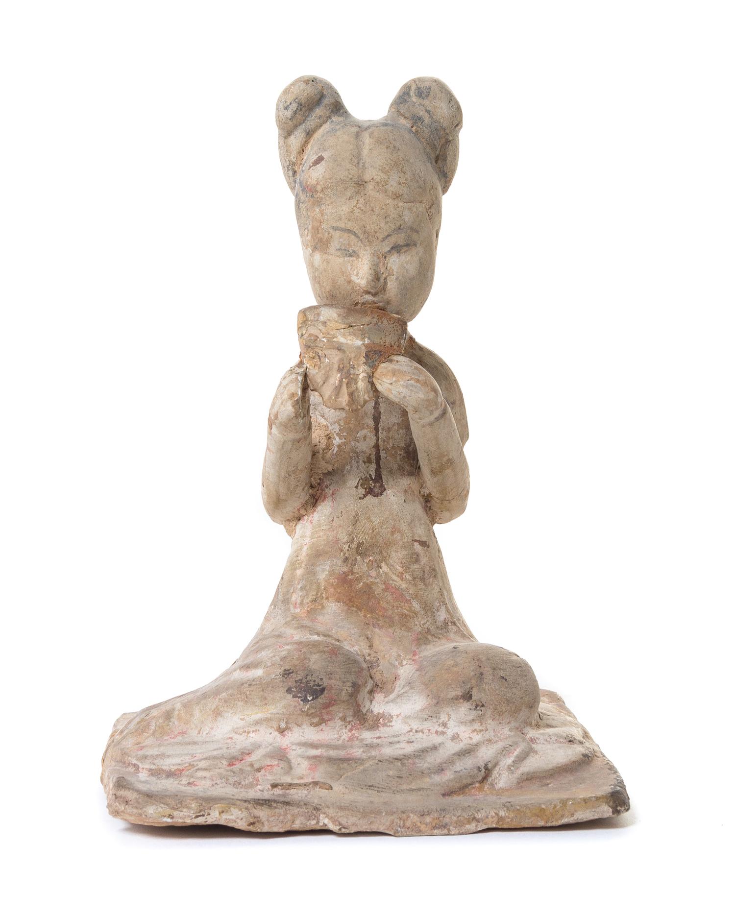 A Pottery Figure of a Female Musician — TANG DYNASTY