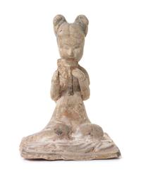 A Pottery Figure of a Female Musician — TANG DYNASTY