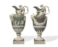 A Pair of Wedgwood Tin-Glazed Earthenware Bacchic Wine Ewers