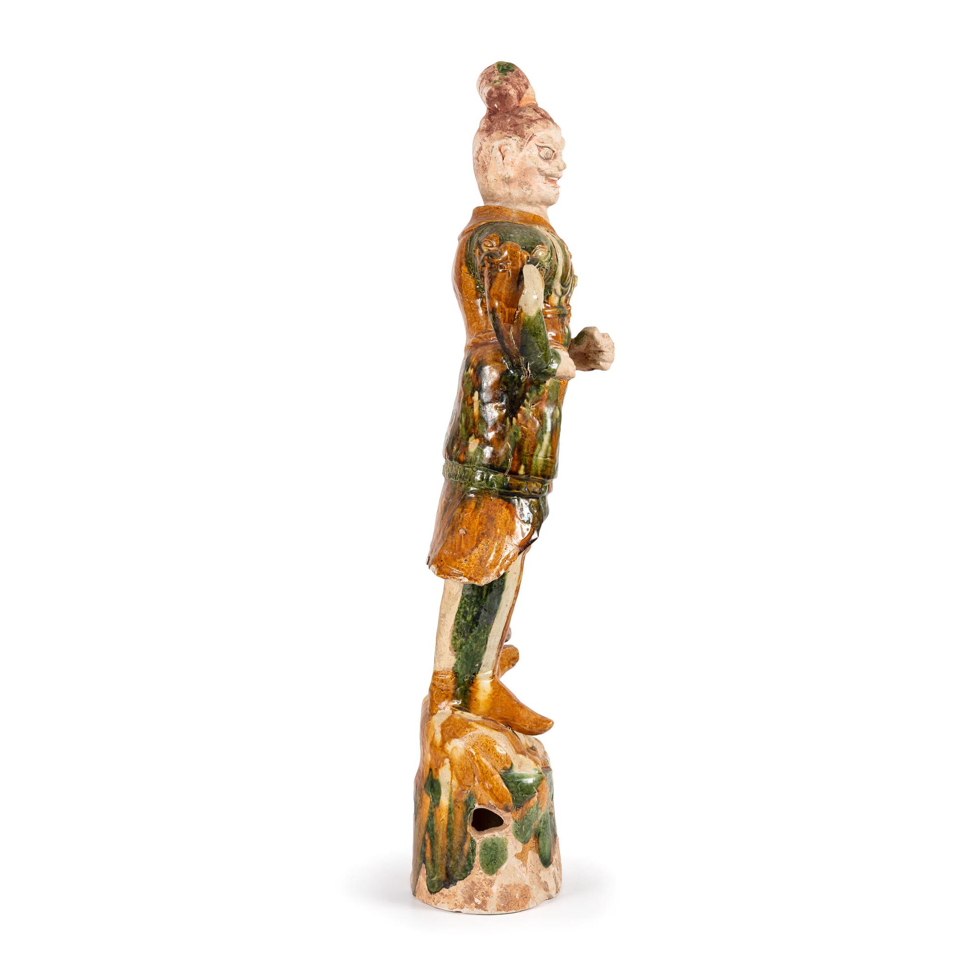 A Monumental Chinese Sancai Warrior Figure