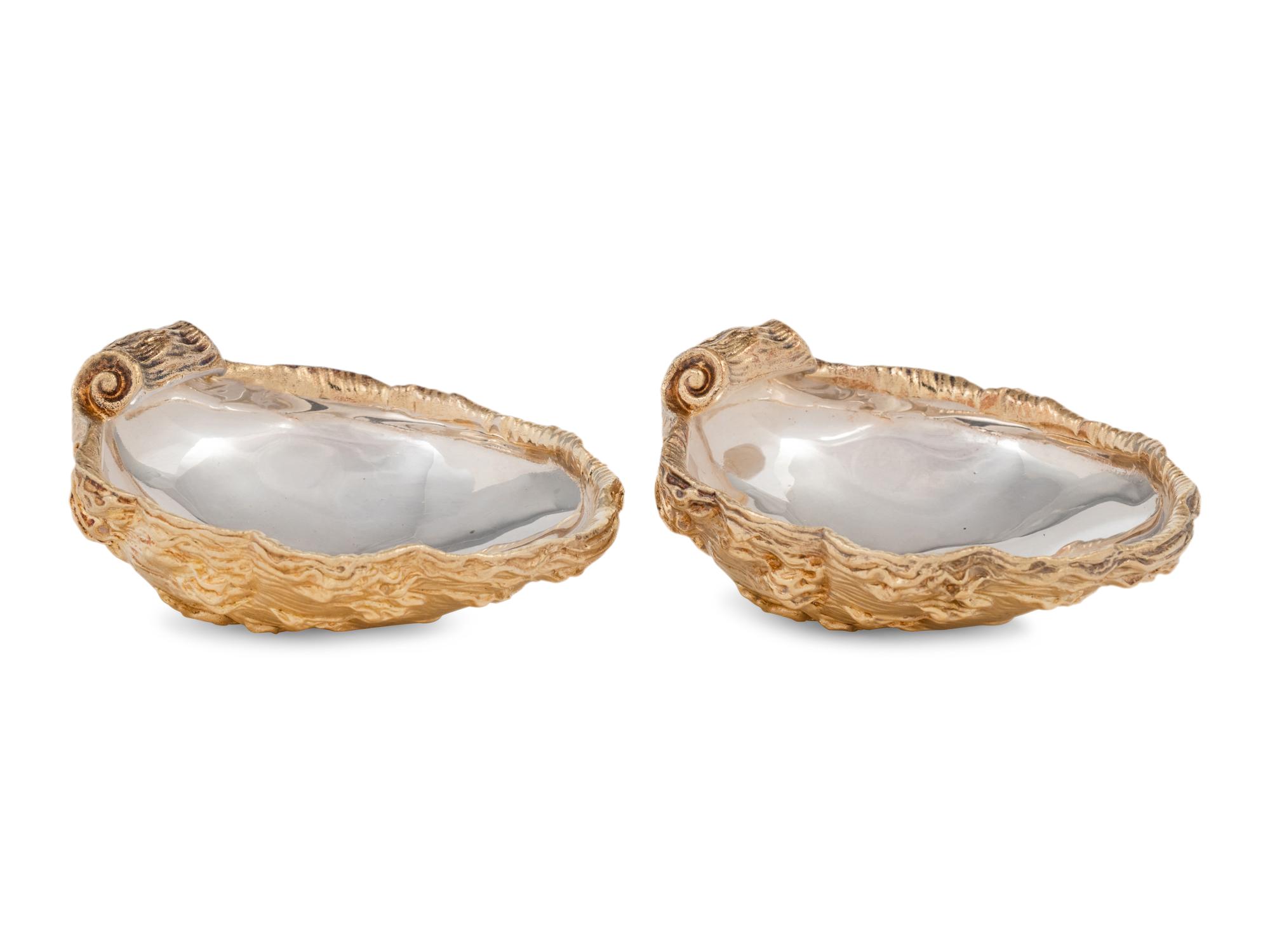 A Pair of French Parcel-Gilt Silver Shell-Form Salt Cellars