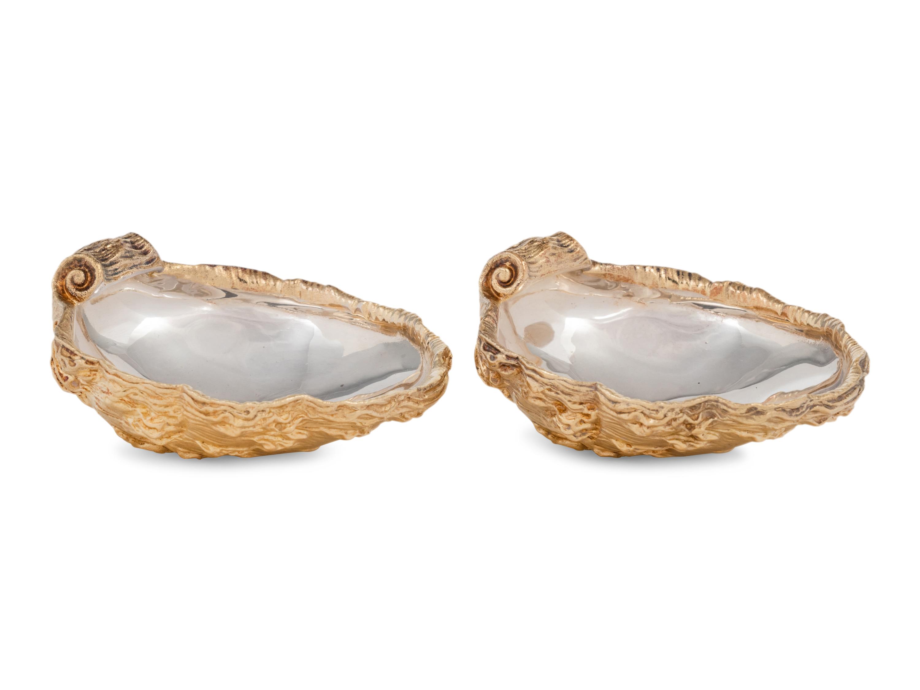 A Pair of French Parcel-Gilt Silver Shell-Form Salt Cellars